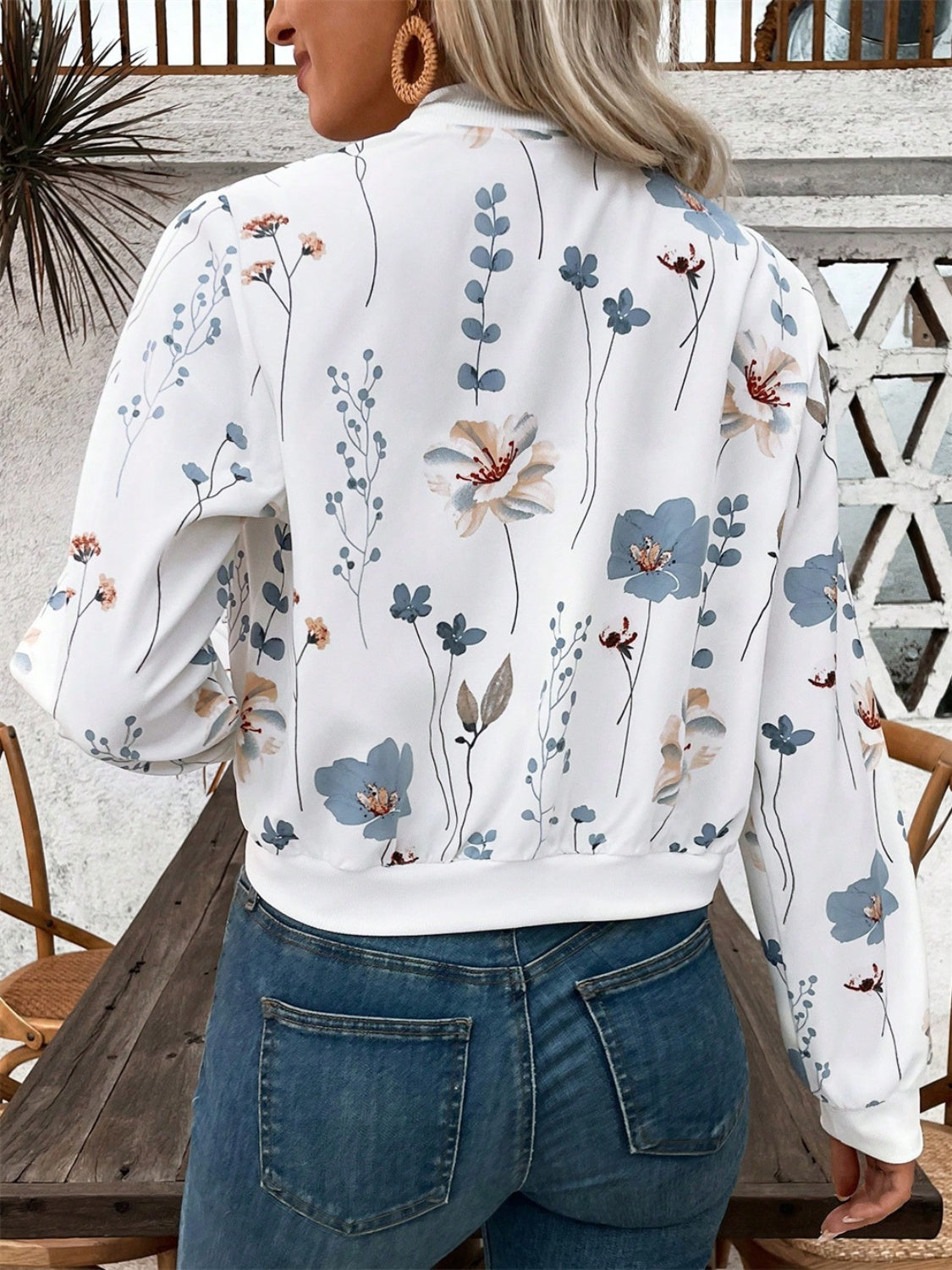 Chaqueta de manga larga con cremallera estampada
