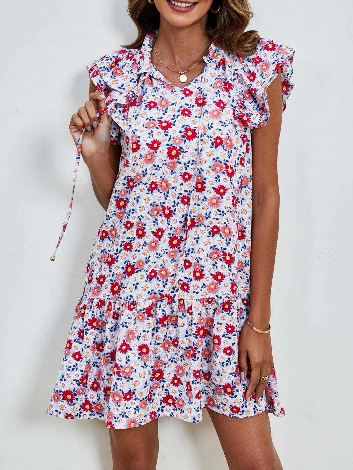 Minivestido con mangas cortas y estampado floral anudado