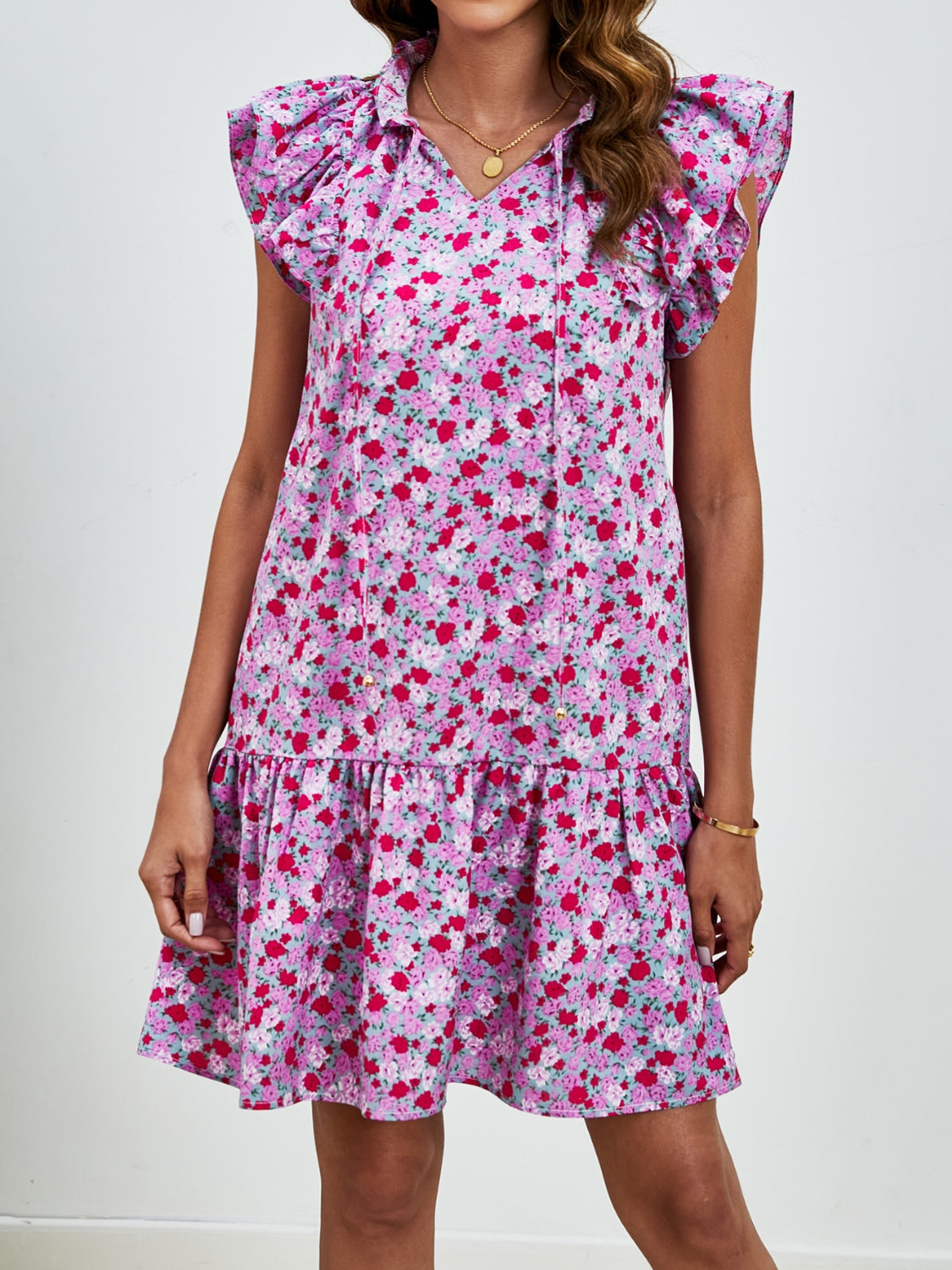 Minivestido con mangas cortas y estampado floral anudado