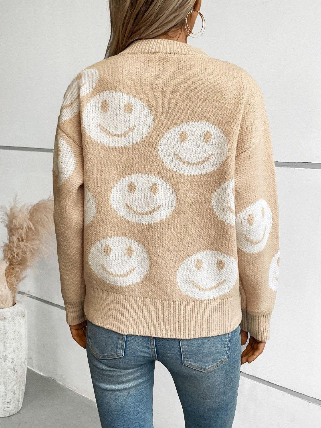 Suéter de manga larga y cuello redondo con estampado de sonrisa