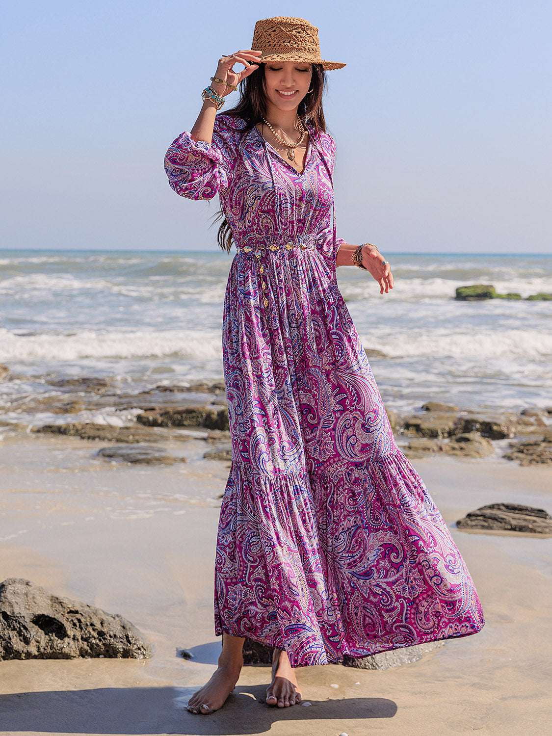 Vestido largo con mangas abullonadas y cuello anudado estampado