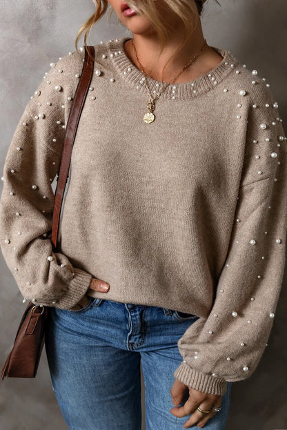 Suéter de manga larga con cuello redondo y detalle de perlas en talla grande