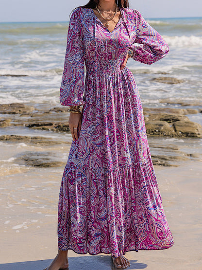 Vestido largo con mangas abullonadas y cuello anudado estampado