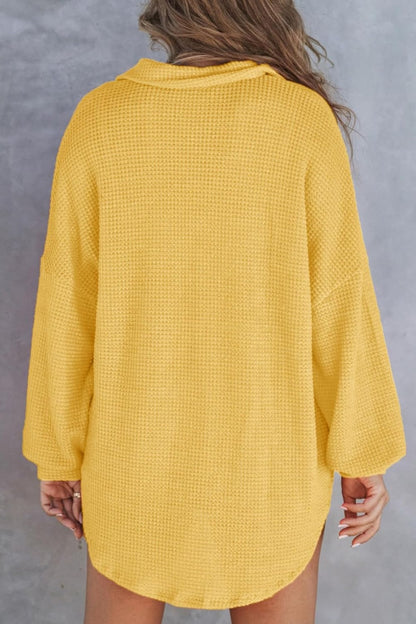 Sudadera de manga larga con medio botón