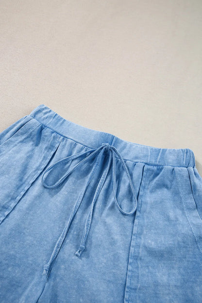 Conjunto de camiseta y pantalones cortos de manga corta con cuello redondo